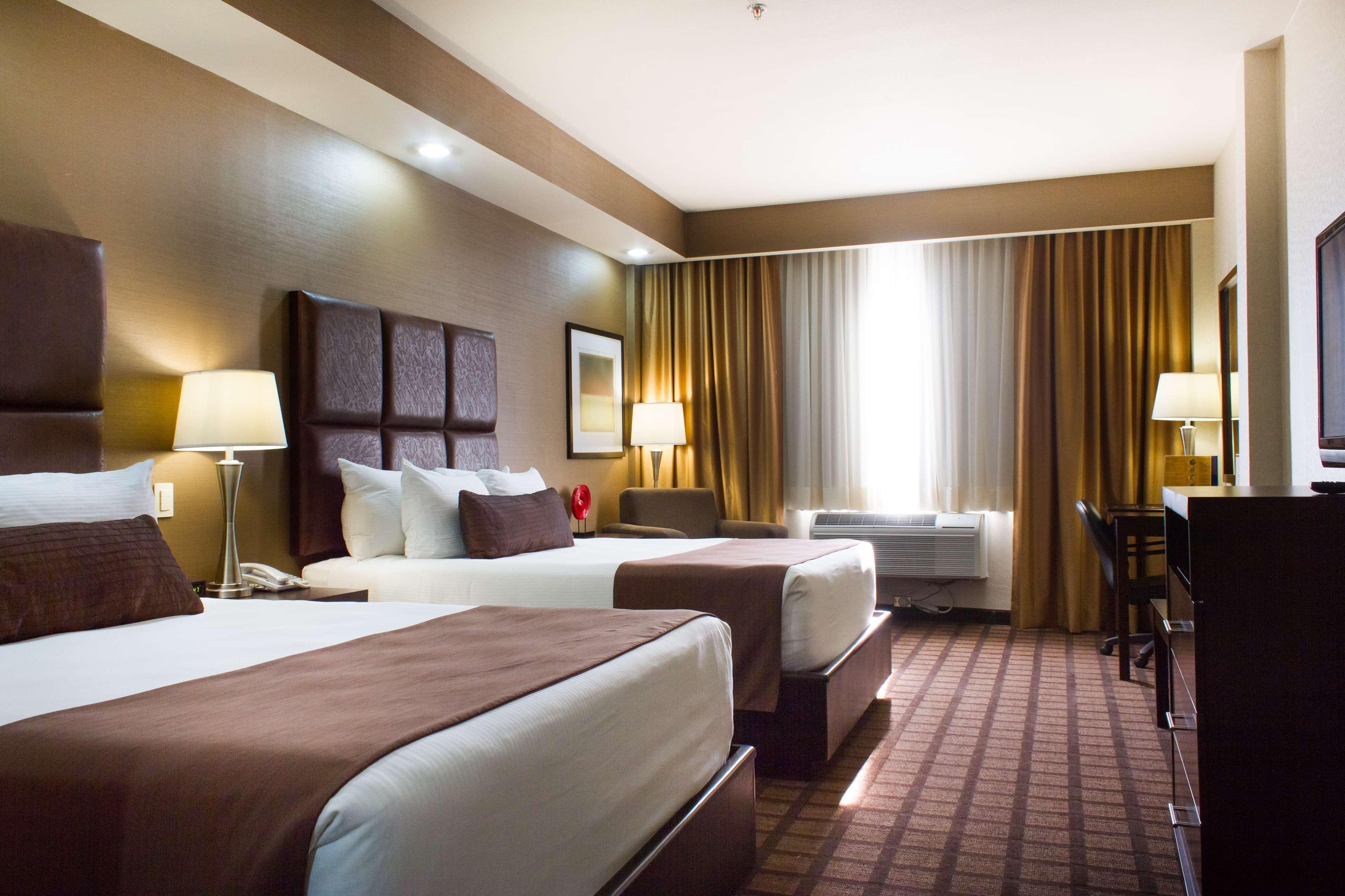 Best Western Premier Monterrey Aeropuerto Esterno foto A typical hotel room