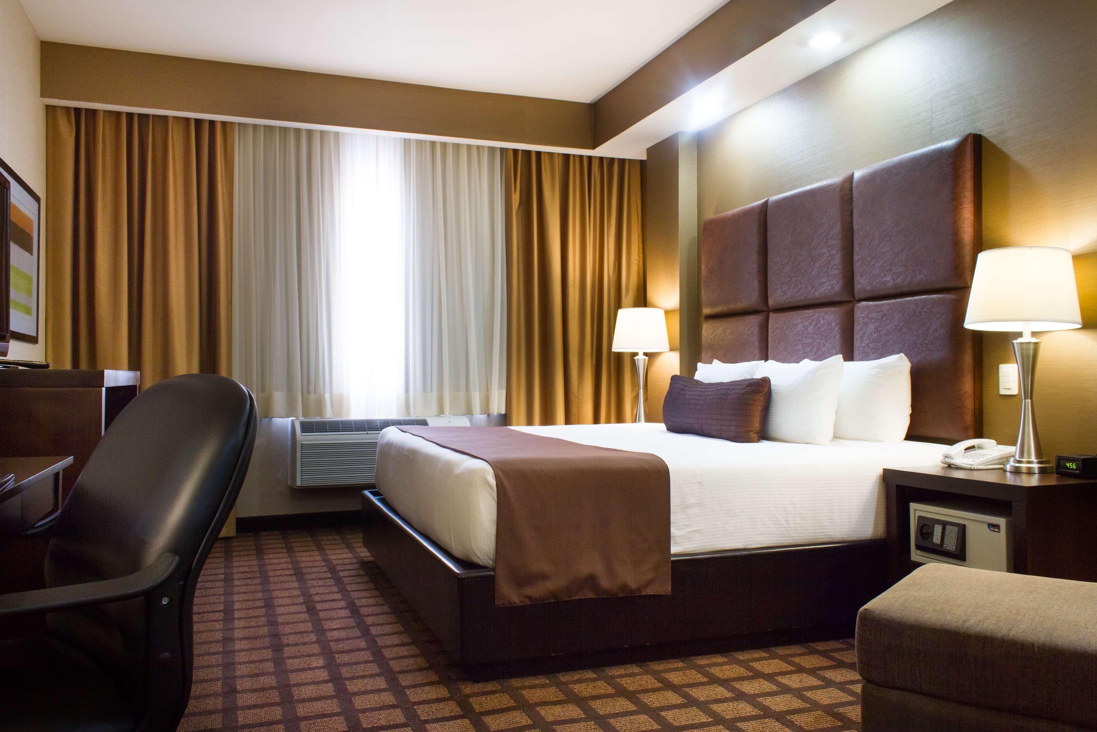 Best Western Premier Monterrey Aeropuerto Esterno foto A typical room at the hotel